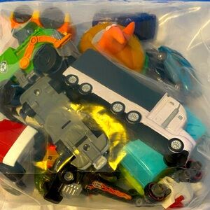 Bag full of odds and ends  little toys good shape
